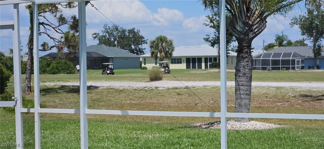86 Pinehurst Pl, Rotonda West, FL 33947 - view of grassy yard