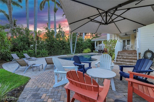 1550 Gordon Dr, Naples, FL 34102 - view of patio with an outdoor pool and a ceiling fan