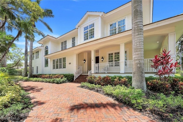 1550 Gordon Dr, Naples, FL 34102 - view of front of property with covered porch