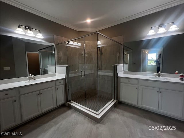 12048 Hawthorn Lake Dr Unit 202, Fort Myers, FL 33913 - full bath with a shower stall, two vanities, crown molding, and tile patterned flooring