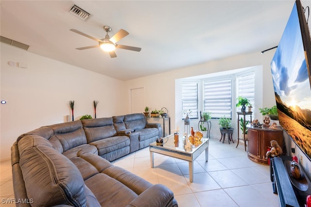 725 Grove Dr, Naples, FL 34120 - living area featuring a ceiling fan and light tile patterned flooring