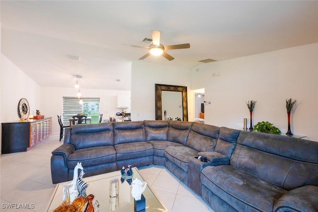 725 Grove Dr, Naples, FL 34120 - living area featuring light tile patterned floors and ceiling fan
