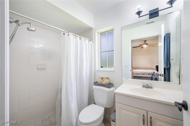 725 Grove Dr, Naples, FL 34120 - ensuite bathroom featuring vanity, tiled shower, and a ceiling fan