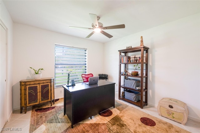 725 Grove Dr, Naples, FL 34120 - office space featuring ceiling fan and light tile patterned floors