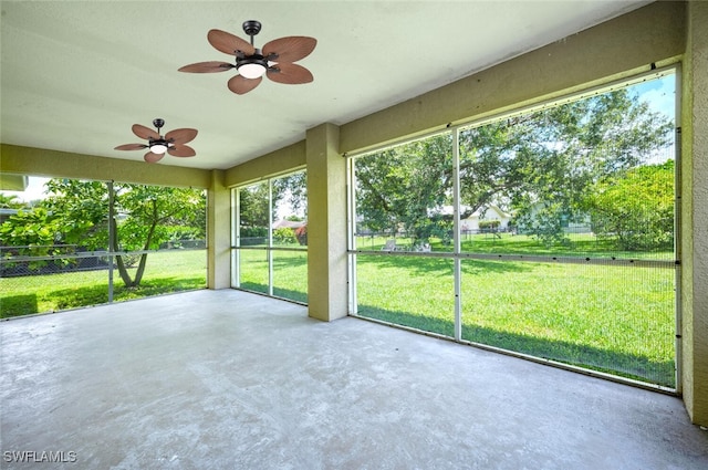 725 Grove Dr, Naples, FL 34120 - unfurnished sunroom featuring ceiling fan