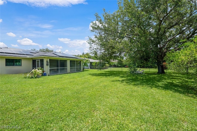 725 Grove Dr, Naples, FL 34120 - view of yard with a sunroom