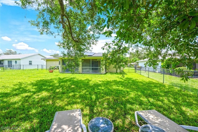 725 Grove Dr, Naples, FL 34120 - fenced backyard featuring a sunroom