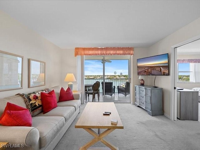 897 Collier Ct Unit 4-705, Marco Island, FL 34145 - living room featuring light colored carpet and baseboards