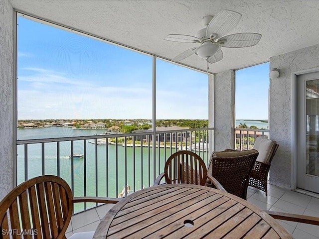 897 Collier Ct Unit 4-705, Marco Island, FL 34145 - sunroom / solarium featuring a water view