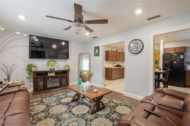 221 Paine Dr, Winter Haven, FL 33884 - living area featuring ceiling fan, light wood-style flooring, baseboards, and recessed lighting