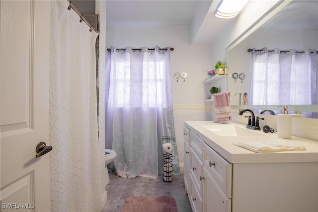 221 Paine Dr, Winter Haven, FL 33884 - bathroom featuring plenty of natural light, vanity, and toilet