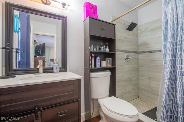 221 Paine Dr, Winter Haven, FL 33884 - full bath featuring toilet, a tile shower, and vanity