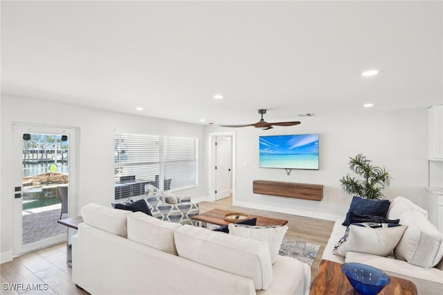 18195 Cutlass Dr, Fort Myers Beach, FL 33931 - living area with light wood-type flooring, recessed lighting, baseboards, and a ceiling fan