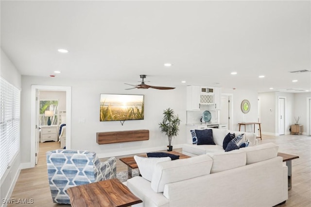 18195 Cutlass Dr, Fort Myers Beach, FL 33931 - living room with recessed lighting, light wood-style flooring, baseboards, and ceiling fan