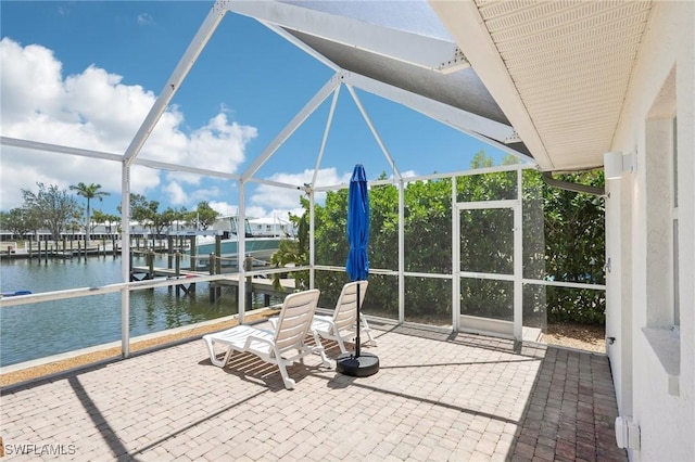 18195 Cutlass Dr, Fort Myers Beach, FL 33931 - unfurnished sunroom with a water view and lofted ceiling
