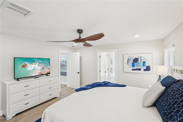 18195 Cutlass Dr, Fort Myers Beach, FL 33931 - bedroom with light wood-style flooring, recessed lighting, ceiling fan, and baseboards