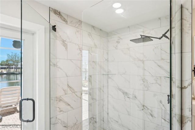 18195 Cutlass Dr, Fort Myers Beach, FL 33931 - bathroom with a shower stall and a water view