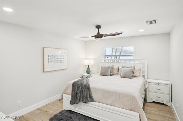 18195 Cutlass Dr, Fort Myers Beach, FL 33931 - bedroom with light wood-style flooring, baseboards, recessed lighting, and a ceiling fan