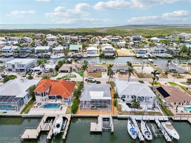18195 Cutlass Dr, Fort Myers Beach, FL 33931 - aerial view of residential area with a large body of water