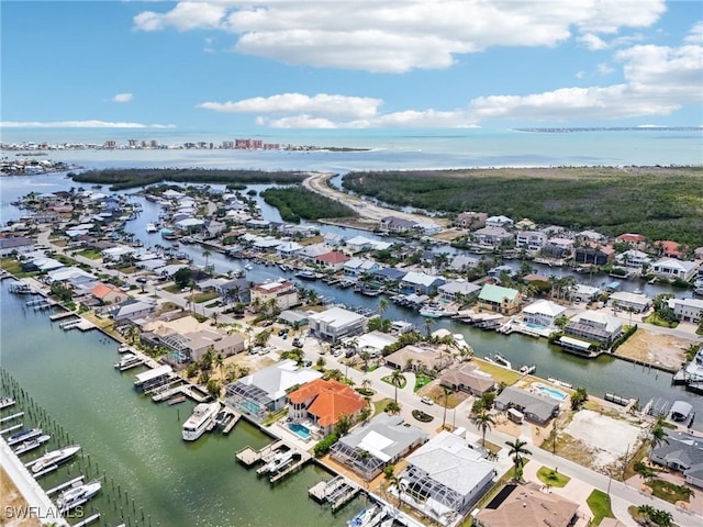 18195 Cutlass Dr, Fort Myers Beach, FL 33931 - aerial perspective of suburban area featuring a large body of water