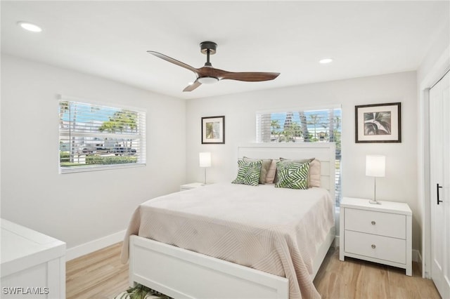18195 Cutlass Dr, Fort Myers Beach, FL 33931 - bedroom featuring light wood-type flooring, recessed lighting, baseboards, and ceiling fan