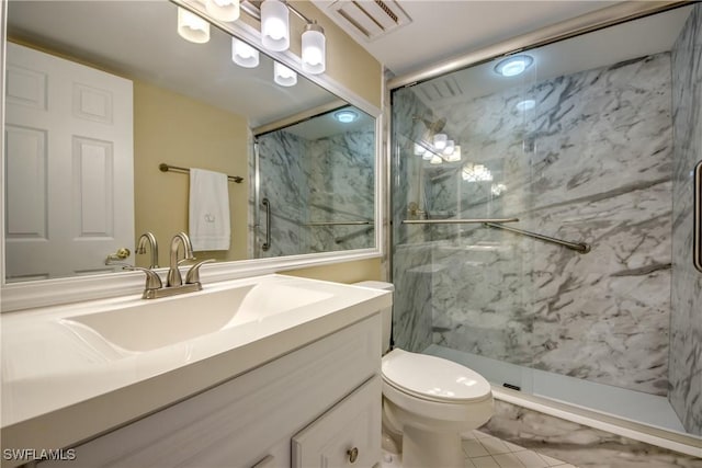 6979 Winkler Rd Unit 131, Fort Myers, FL 33919 - bathroom featuring a marble finish shower, vanity, toilet, and tile patterned flooring
