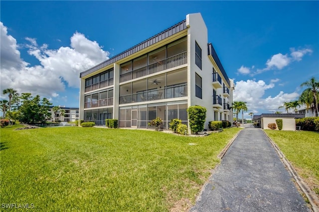 6979 Winkler Rd Unit 131, Fort Myers, FL 33919 - view of apartment building / complex
