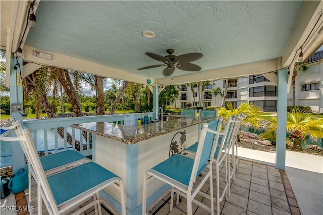 6979 Winkler Rd Unit 131, Fort Myers, FL 33919 - view of patio featuring a ceiling fan