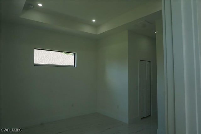 826 Alido Ave, Lehigh Acres, FL 33971 - empty room with recessed lighting and a raised ceiling