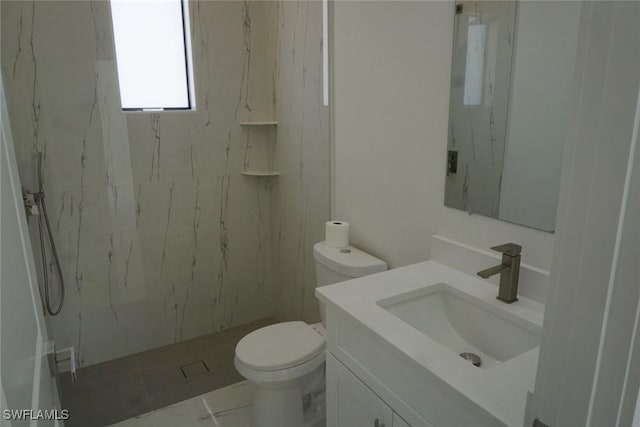 826 Alido Ave, Lehigh Acres, FL 33971 - bathroom featuring vanity, a marble finish shower, toilet, and marble look tiles