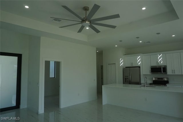826 Alido Ave, Lehigh Acres, FL 33971 - kitchen featuring appliances with stainless steel finishes, a sink, recessed lighting, a ceiling fan, and white cabinetry