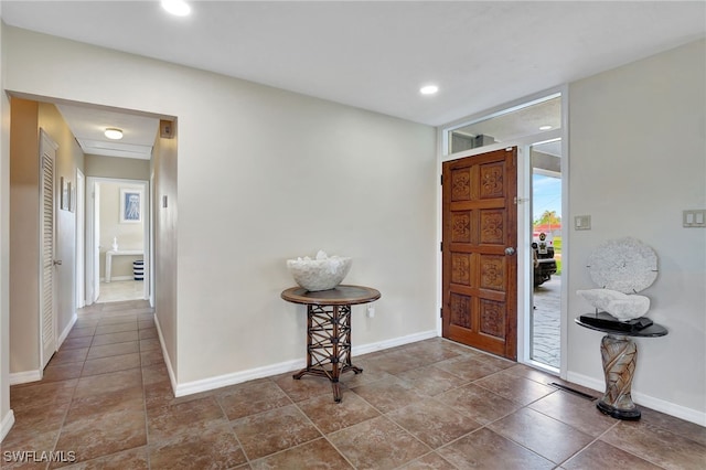 250 Bangsberg Rd SE, Port Charlotte, FL 33952 - entrance foyer with baseboards and recessed lighting