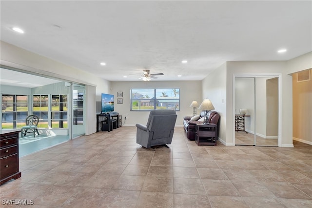 250 Bangsberg Rd SE, Port Charlotte, FL 33952 - living area with recessed lighting, ceiling fan, and baseboards