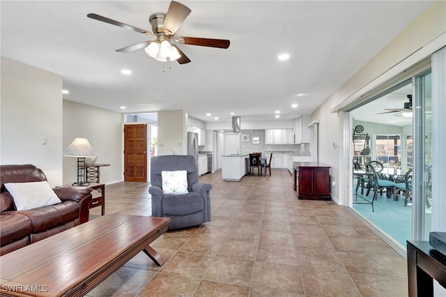 250 Bangsberg Rd SE, Port Charlotte, FL 33952 - living area with ceiling fan, recessed lighting, and baseboards