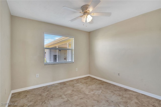 250 Bangsberg Rd SE, Port Charlotte, FL 33952 - empty room with ceiling fan and baseboards