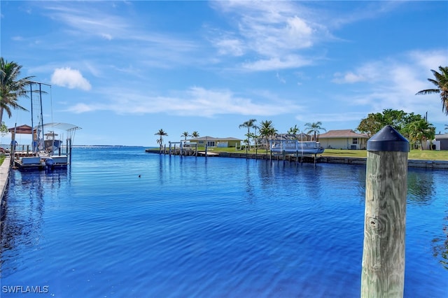 250 Bangsberg Rd SE, Port Charlotte, FL 33952 - dock featuring a water view, boat lift, and a residential view