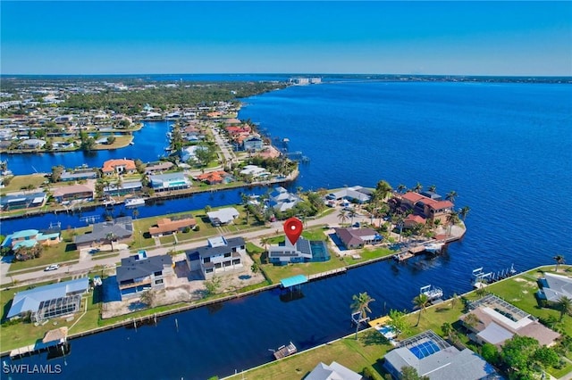 250 Bangsberg Rd SE, Port Charlotte, FL 33952 - aerial view of residential area with a large body of water