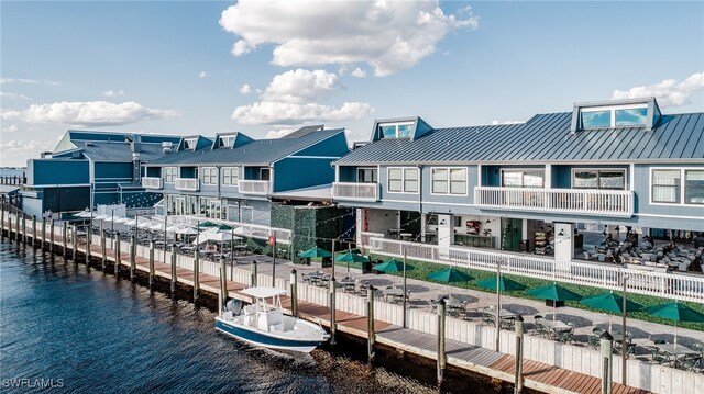 250 Bangsberg Rd SE, Port Charlotte, FL 33952 - dock area with a water view and cooling unit