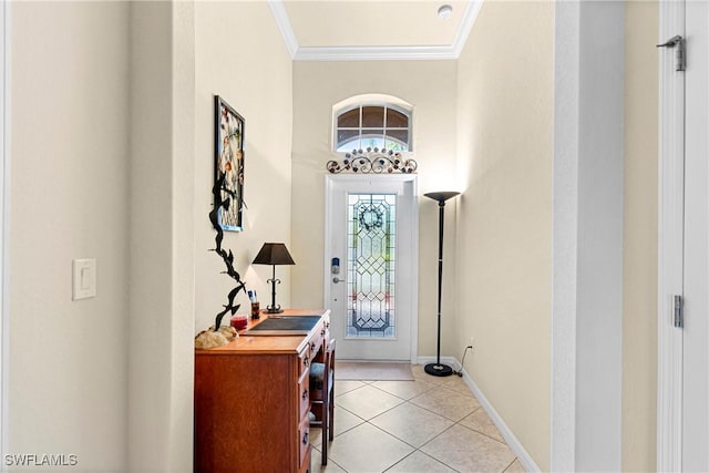 11430 Icarus Cir, Lehigh Acres, FL 33971 - entrance foyer featuring crown molding, light tile patterned flooring, and baseboards