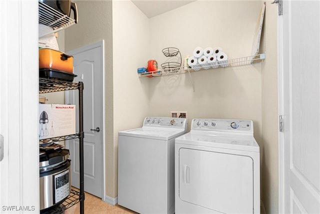 11430 Icarus Cir, Lehigh Acres, FL 33971 - laundry area with washer and clothes dryer