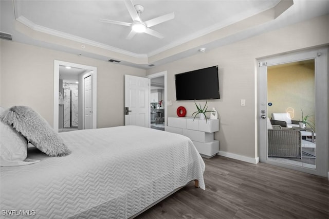 1793 Four Mile Cove Pkwy Unit 723, Cape Coral, FL 33990 - bedroom featuring a tray ceiling, baseboards, wood finished floors, ornamental molding, and ensuite bath