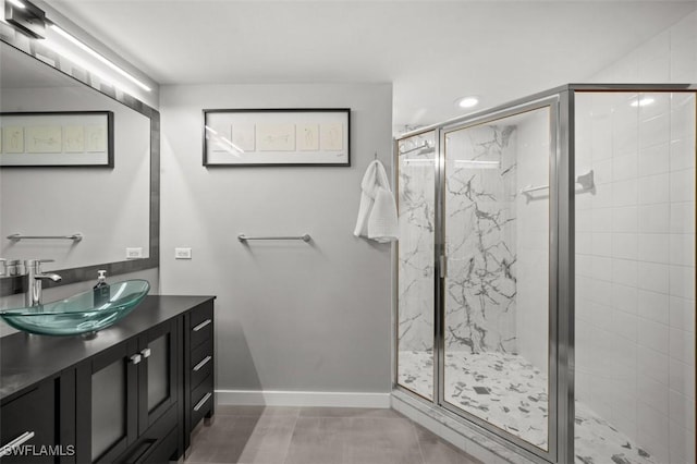 1793 Four Mile Cove Pkwy Unit 723, Cape Coral, FL 33990 - bathroom featuring a marble finish shower, baseboards, vanity, recessed lighting, and tile patterned floors