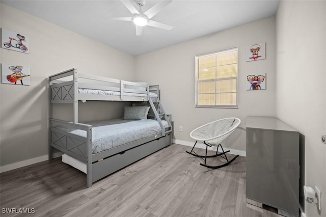 1793 Four Mile Cove Pkwy Unit 723, Cape Coral, FL 33990 - bedroom featuring wood finished floors, baseboards, and ceiling fan