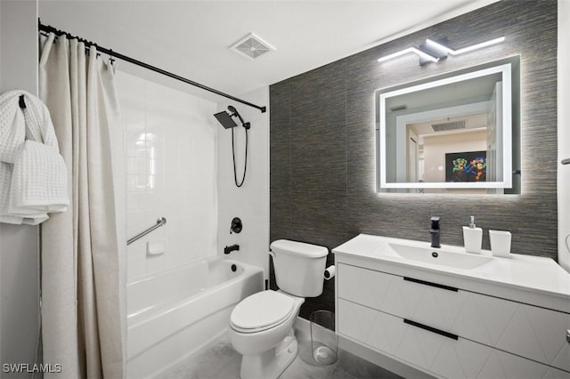 1793 Four Mile Cove Pkwy Unit 723, Cape Coral, FL 33990 - bathroom featuring toilet, vanity, shower / bathtub combination with curtain, and tile walls