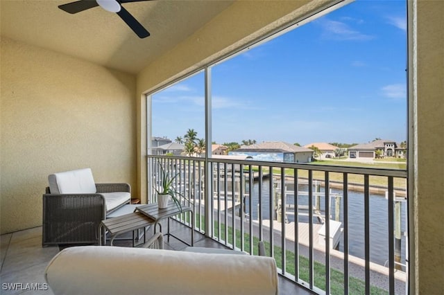 1793 Four Mile Cove Pkwy Unit 723, Cape Coral, FL 33990 - balcony featuring a water view, a ceiling fan, and a residential view