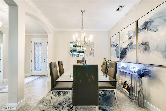 19197 Elston Way, Estero, FL 33928 - dining room with arched walkways, a chandelier, crown molding, and baseboards
