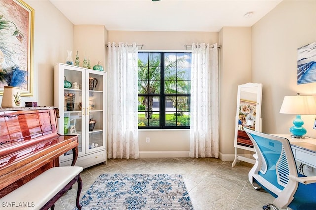 19197 Elston Way, Estero, FL 33928 - tiled office space featuring healthy amount of natural light and baseboards