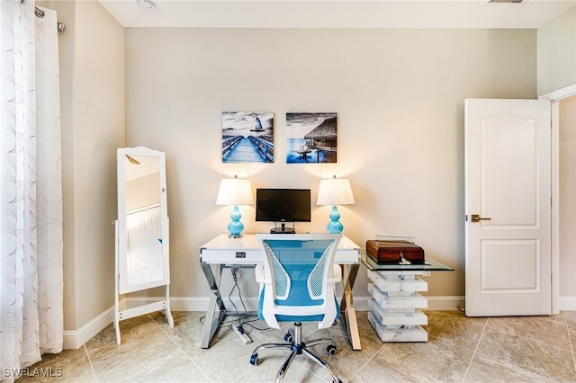 19197 Elston Way, Estero, FL 33928 - home office with tile patterned flooring and baseboards