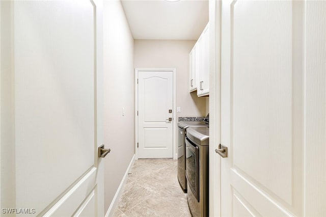 19197 Elston Way, Estero, FL 33928 - laundry area with washing machine and clothes dryer, cabinet space, and baseboards