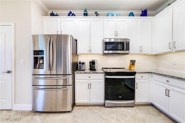 19197 Elston Way, Estero, FL 33928 - kitchen featuring stainless steel appliances, light stone countertops, white cabinets, decorative backsplash, and crown molding